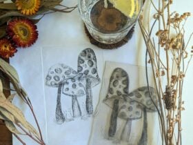 Dry point etching sample plate featuring mushrooms on the printed paper with gin & tonic..