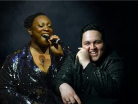 woman with microphone and man