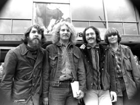 Crredence clearwater. Four man in a black and white picture