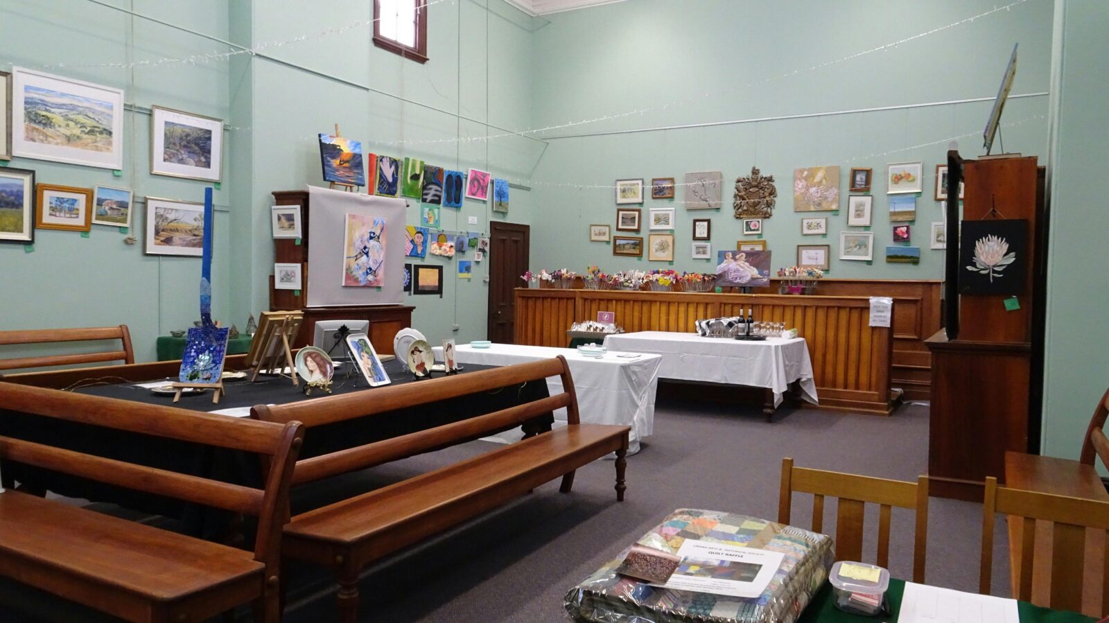 Art work is displayed around the Old Courthouse Museum. All artwork is for Sale.