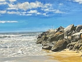 Capturing the contrast of fluidity of water & waves against man-made rock formation.