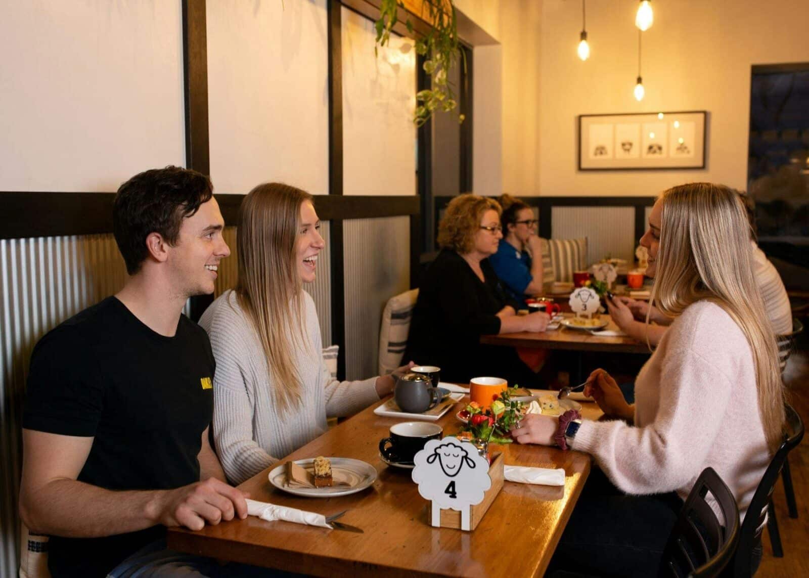 Group of people seated at cafe