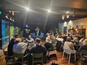 Guests enjoying live music at Club Forbes