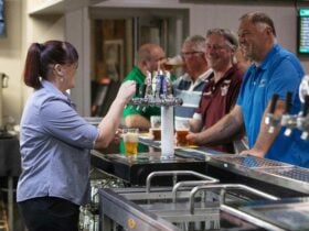 Nat serving drinks Crookwell Services Club
