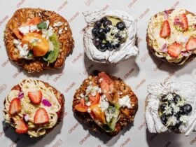 Assortment of colourful pastries on a tray at Crumb