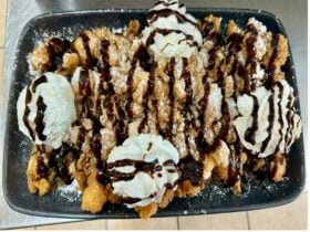 Funnel Cake with cream and chocolate sauce