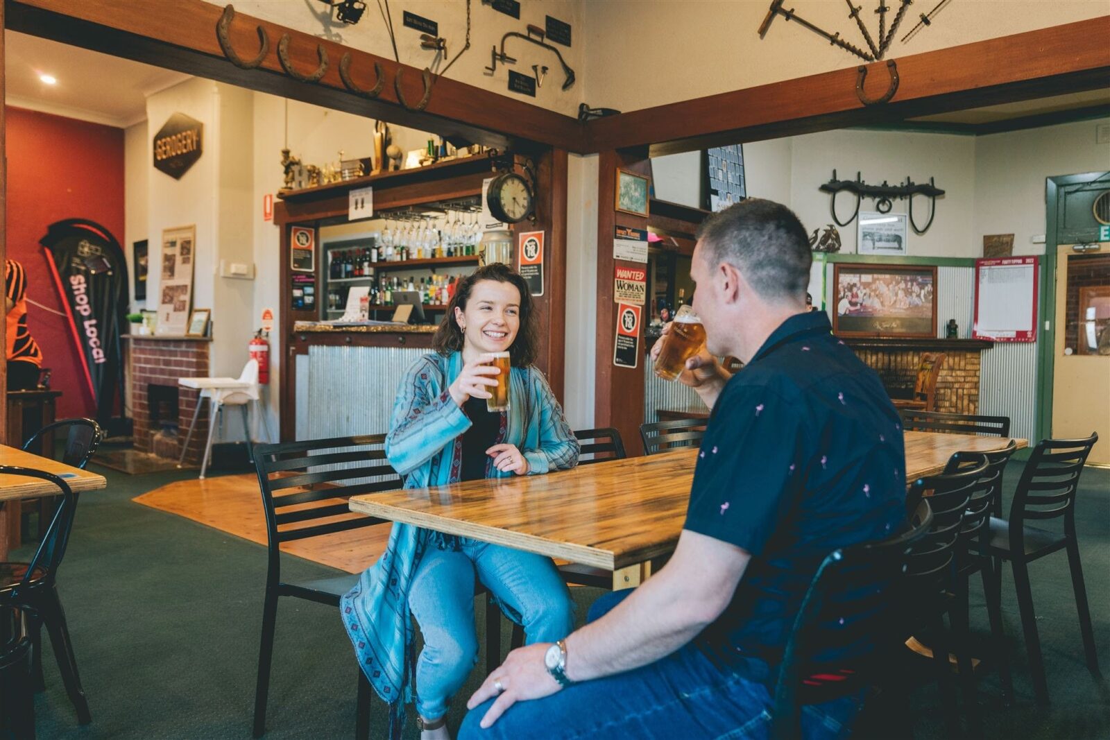 A couple having a drink in the main bar area