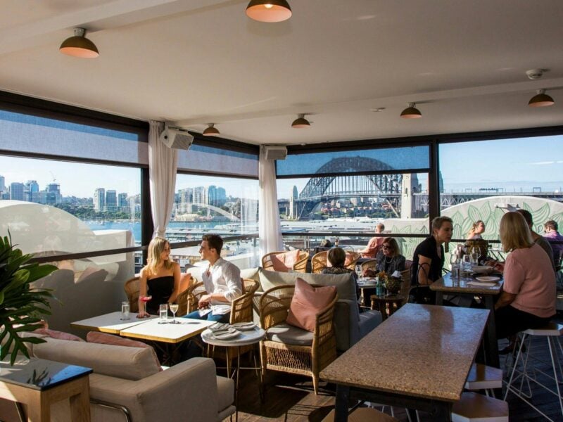 People enjoying food and drink at Henry Deane