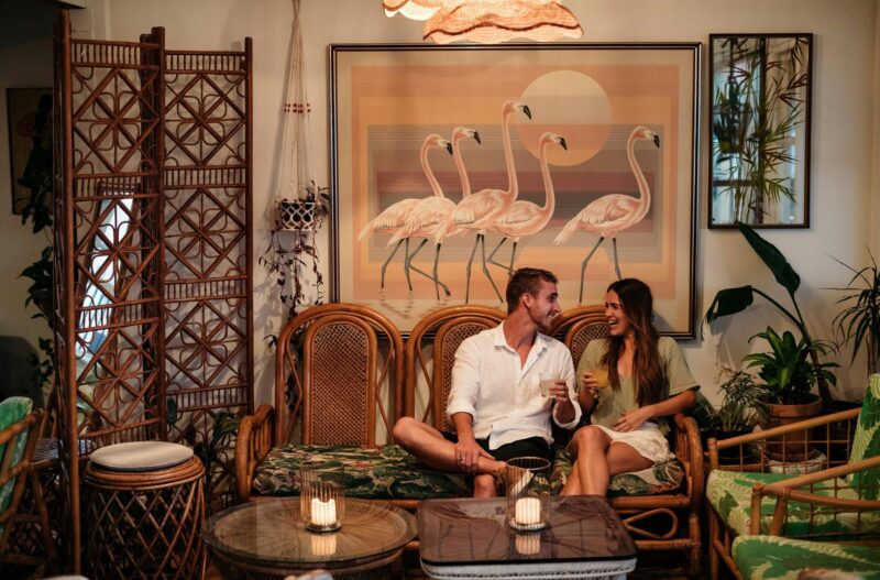 Couple enjoying cocktails at Mumbo Jumboâs Beachhouse, Terrigal
