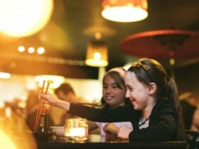 Girls using chopsticks