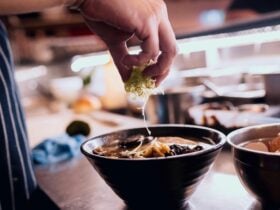 Chef making a bowl of ramen at the Rising Sun Workshop cafe