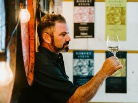 Jacob Stein assessing wine