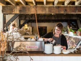 Barista making coffee at The Wharf Local cafe in Tathra
