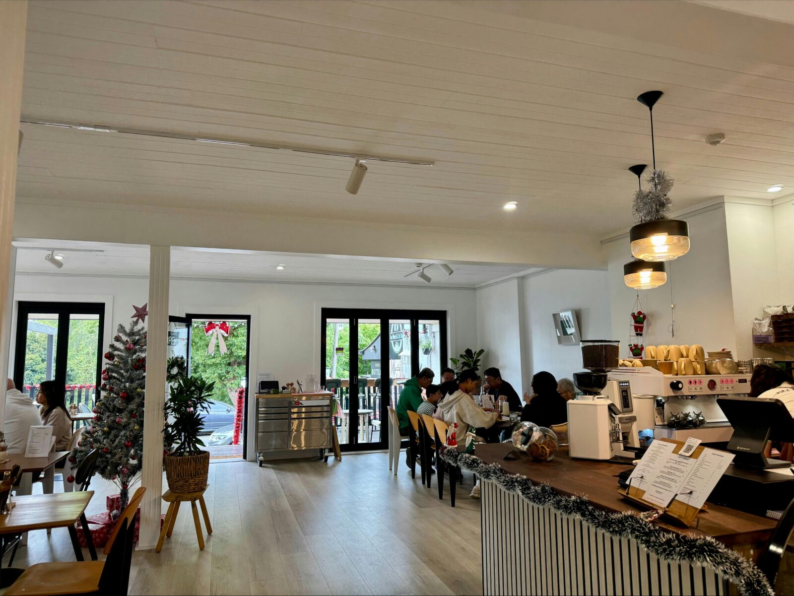 Bright Cafe seating area with natural light at Valley Bliss Eatery