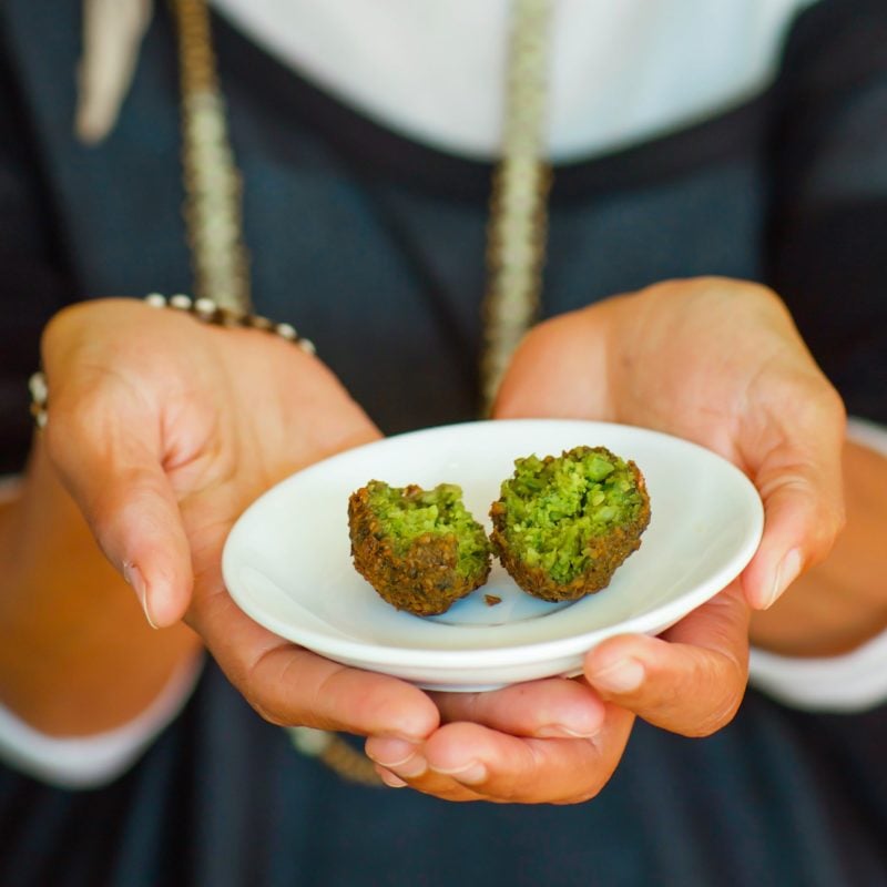 Lady holding falafel