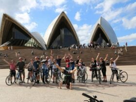 Group on a Bonza Bike Tour in front of Sydney Opera House