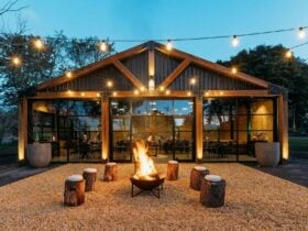 Event building for conference retreats and meetings with a firepit for work events fairy lights