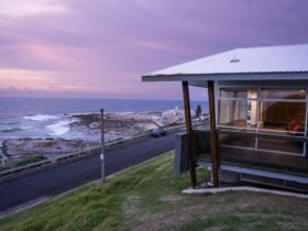 Fort Scratchley Function Centre overlooking ocean at sunset