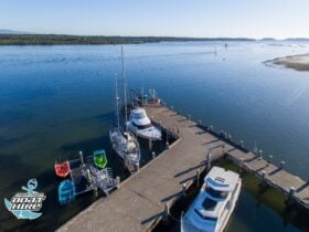 Wharf with boats on river