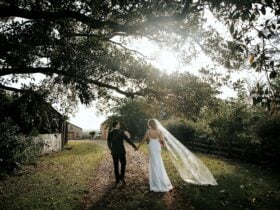 Bride & Groom strolling into the sunset