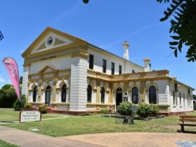 The Old Court House Building, Boorowa. Front entrance with an adjacent park/seating area.