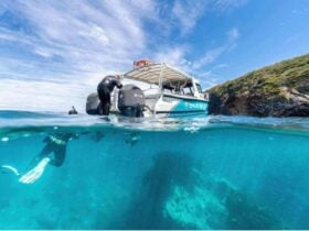 Boat on water, snorkel below surface