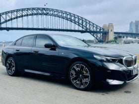 BMW i5 in front of Sydney Opera House