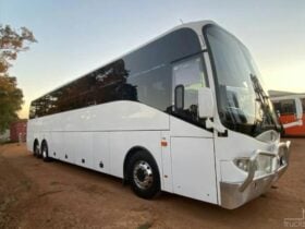 white color charter bus