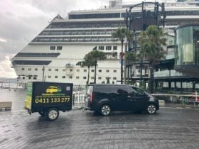 Transportransport vehicle parked near the cruise terminal ready for passenger drop-off