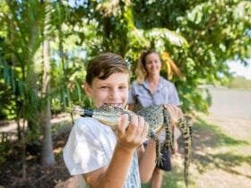 Child Holding Croc