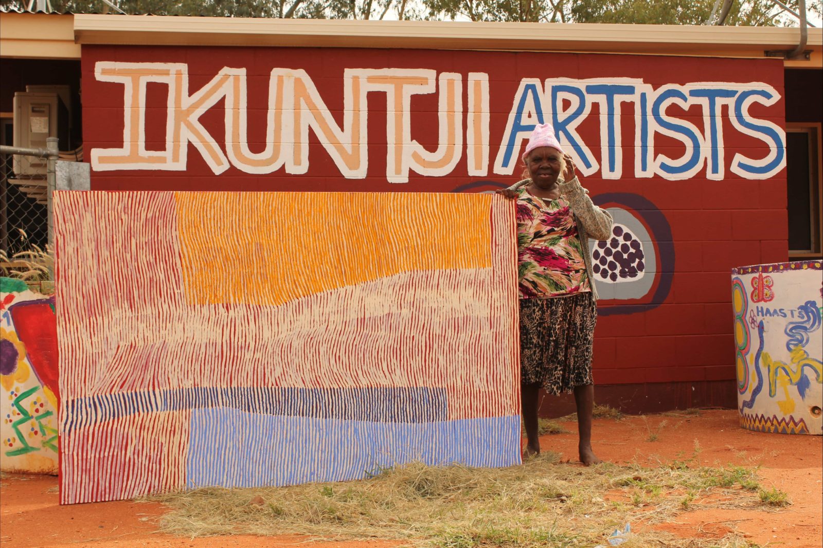 Artist Eunice Napanangka Jack with artwork