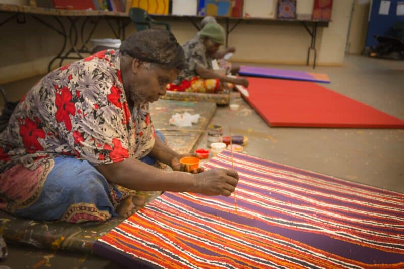 Works in progress by Eileen Anyama (front), Eunice Napanangka Jack and Kumantjai Nolan