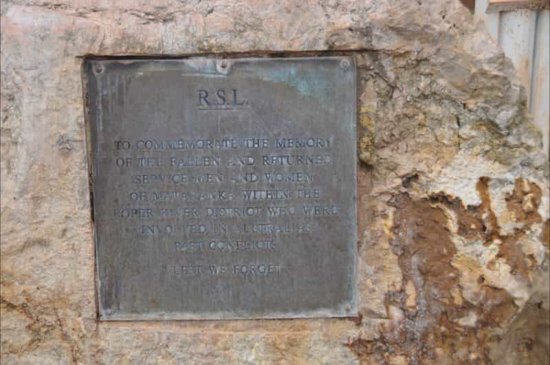 Brass plaque fixed to the memorial.