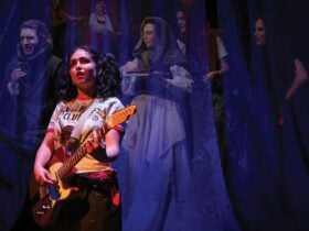 Photograph of performer Stevie Jean with a guitar with images collaged in the background