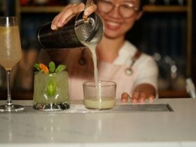 Award winning bartender pouring a cocktail