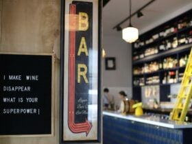 Sign that states 'Bar' with the background of Stone House bar
