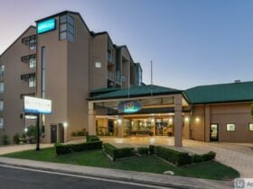 The hotel is in a 5 story building aw well as the smaller restaurant building. We are easily seen.