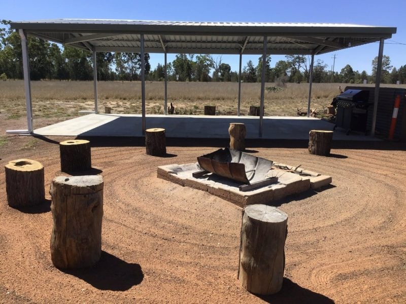 Shelter and fire pit