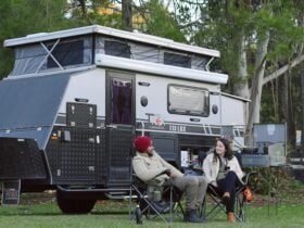 The campsite is leafy with manicured lawns and gardens.