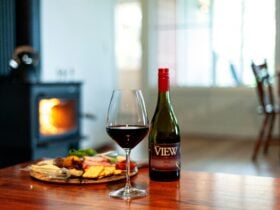 wine and cheese by the fire in Shiraz Cottage at Sancerre Estate on the Granite Belt, Queensland