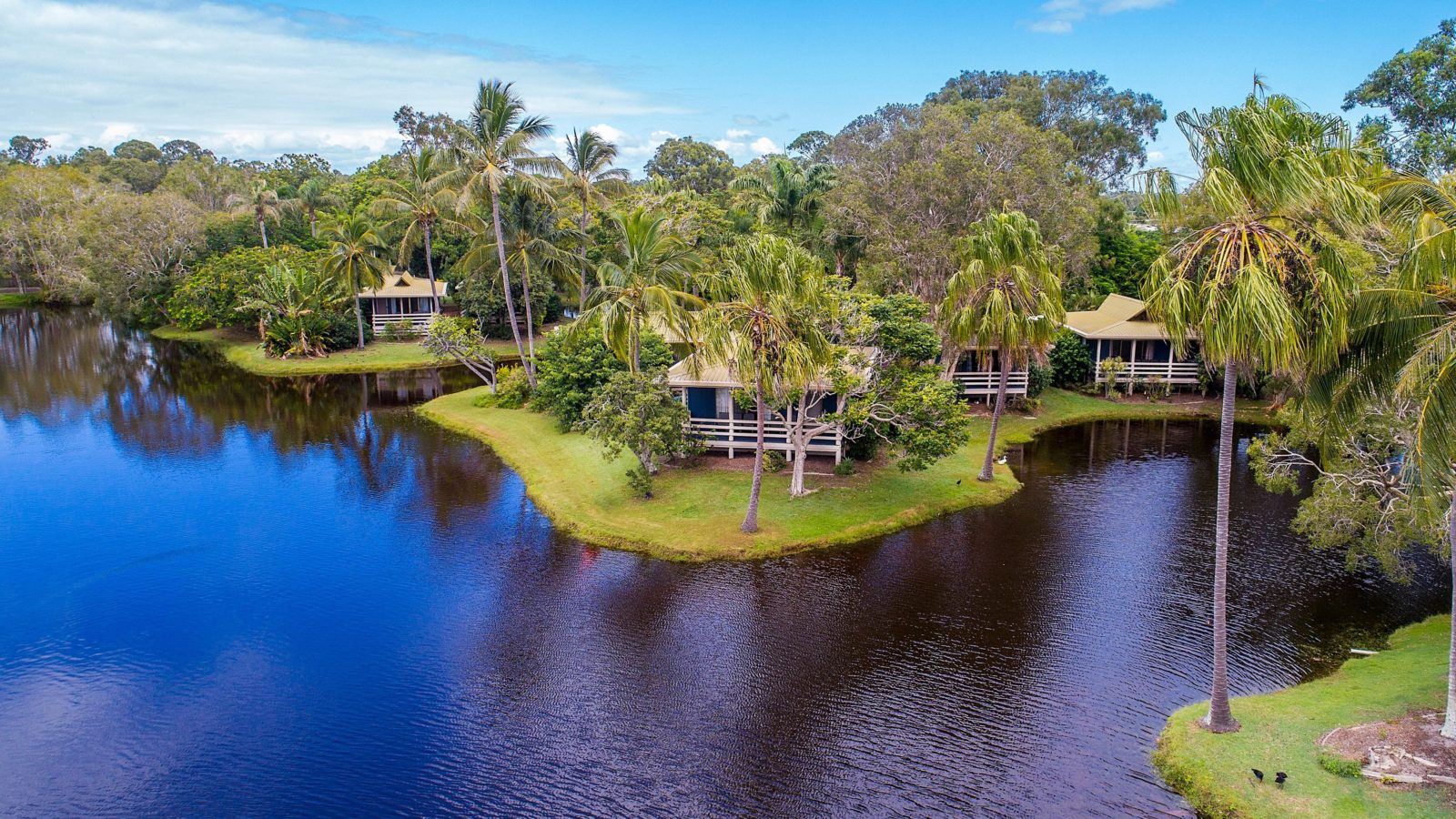 A quiet relaxing holiday with a lakeside view from every villa