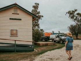 Woman walking to the Talwood Recreation Grounds building