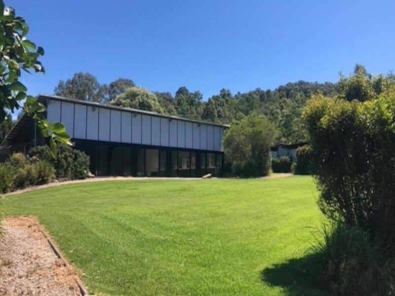View of the Regenerative Training Centre during the day brilliant blue sky
