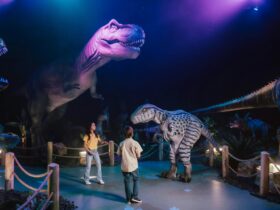 Children interacting with Dino animatronics