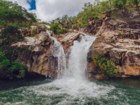 Granite bolders with crystal clear flowing waterfall