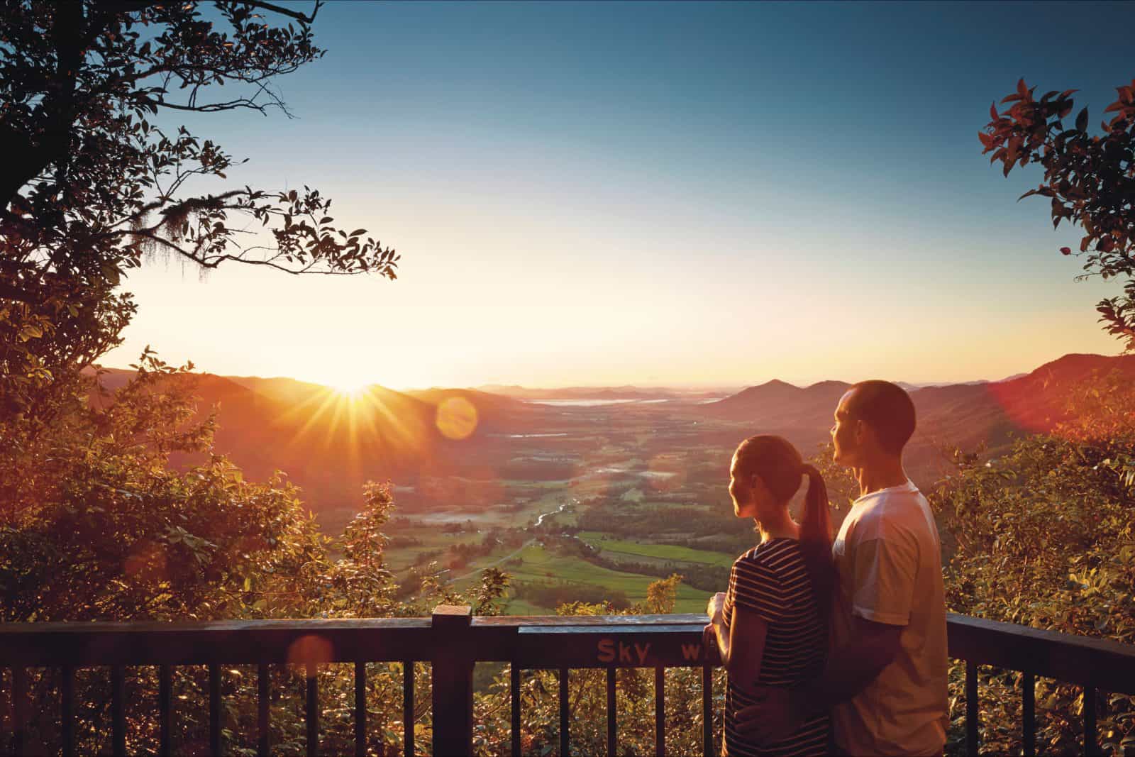 Couple at Sky Window lookout with Pioneer Valley view.