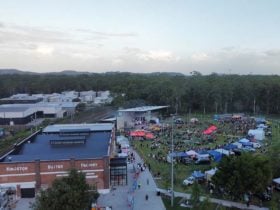 Kingston Butter Factory building, large out door stage and green space.