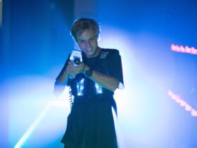 Young adult plays Laser Tag