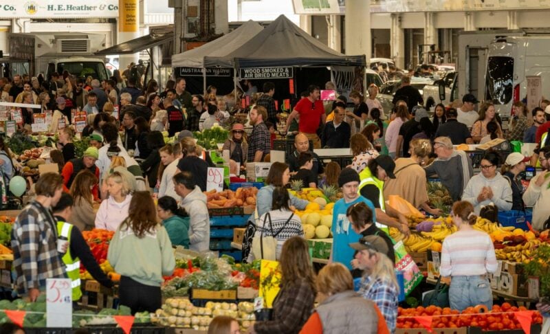 crowds of people browsing the market stalls