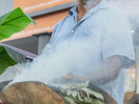 T.O. Henry Fourmile conducting smoking ceremony at UMI Arts